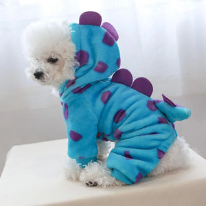 Poodle in dinosaur costume