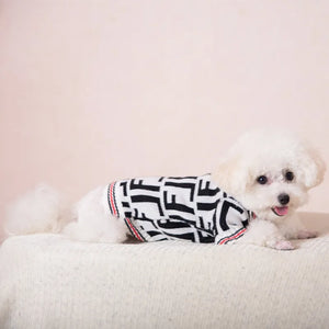 Fendi designer-inspired dog sweater cardigan is white with black and red stripes on the sleeves and trim and large F letters print throughout