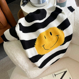 This Happy Face Dog Sweater will brighten up your day