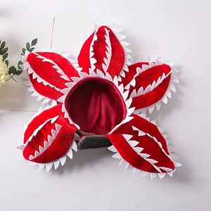 Halloween Red Canibal Flower Dog Hat secures with Velcro strap under the chin.