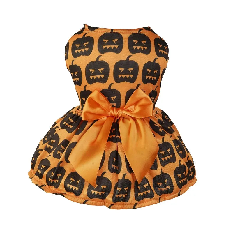 For small and medium dogs only, this black Halloween Jack-o-Lantern dog dress is orange, with an orange bow and black pumpkins.