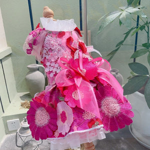 Hot Pink Daisy Dog Party Dress fits small and medium dogs like Toy Poodle.