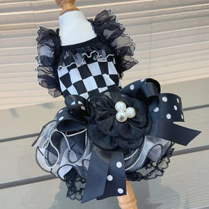 Simply spectacular, this elegant Black & White Harlequin Party Dog Dress is adorned with a lace bodice collar and sleeves. 