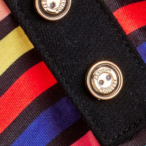 Two decorative buttons adorn the Rainbow Striped Dog Polo Shirt.