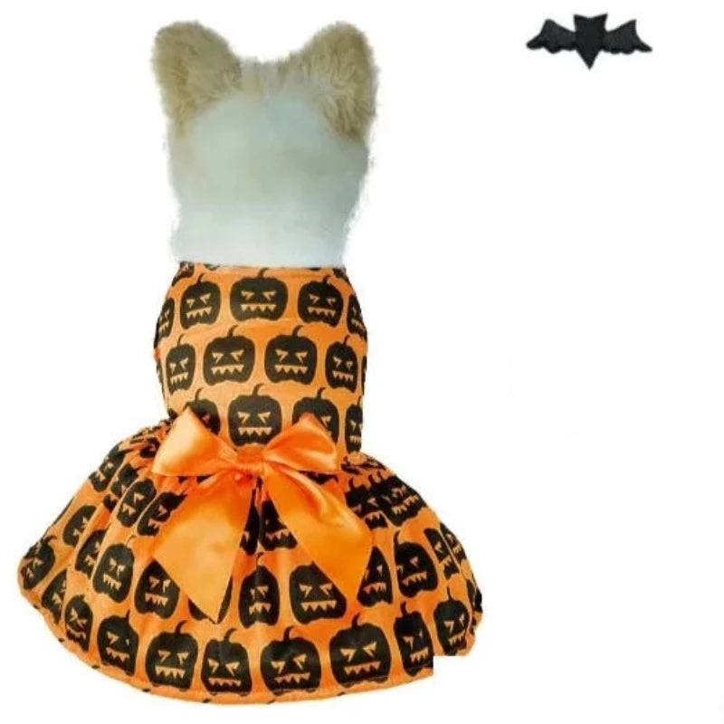 For small and medium dogs only, this black Halloween Jack-o-Lantern dog dress is orange, with an orange bow and black pumpkins.
