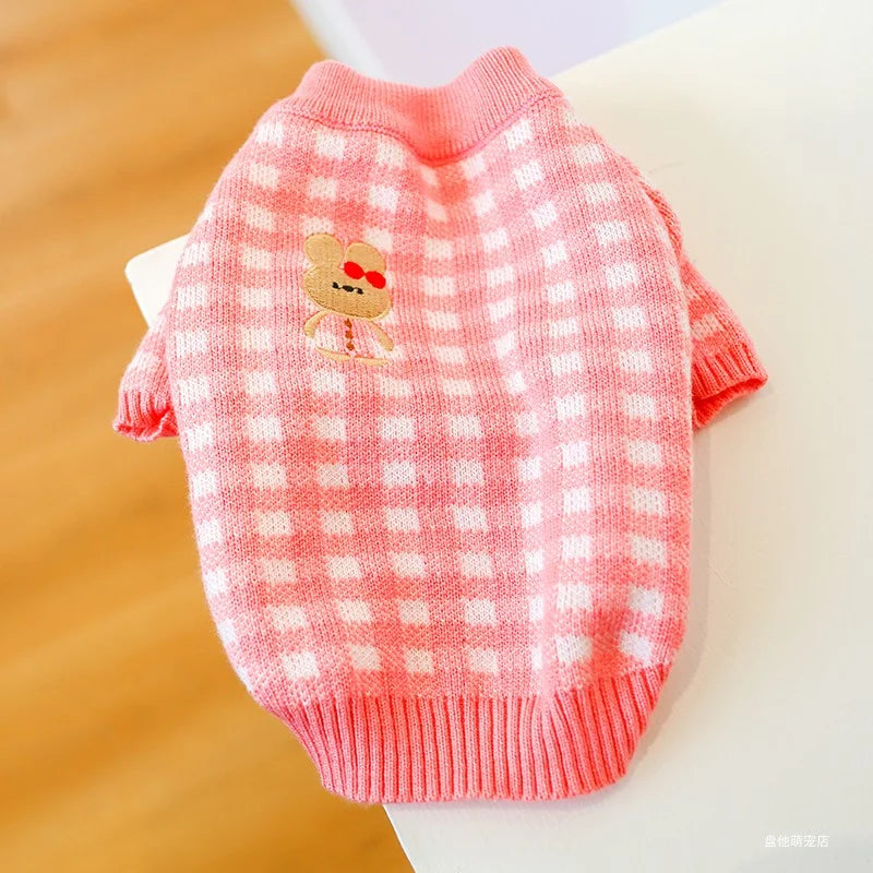 Introducing our charming Pink Plaid Dog Sweater with Bunny Applique, a delightful addition to your pup's wardrobe. 