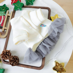 White snowman dog outfit has 3 snap buttons for easy on off. 