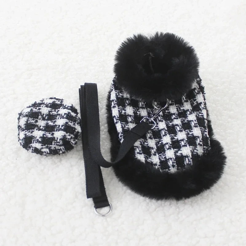 Matlese wearing the Tres Chic Black Houndstooth Dog Coat, Cap & Leash Set.