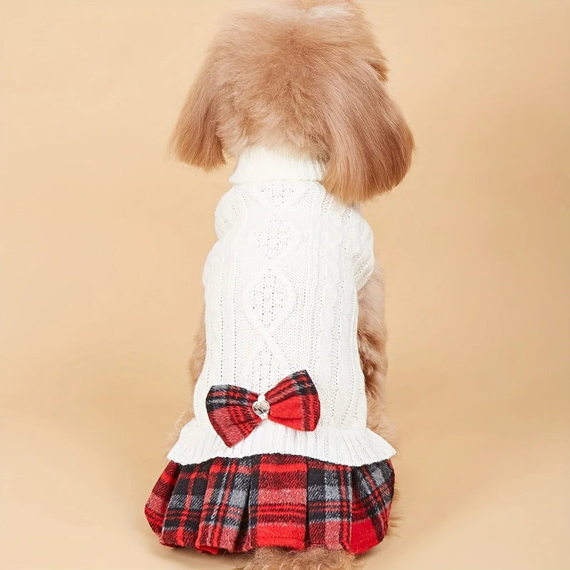 White sweater with a red plaid skirt and bow