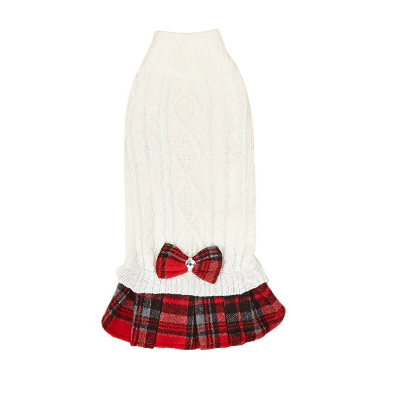 White sweater with a red plaid skirt and bow
