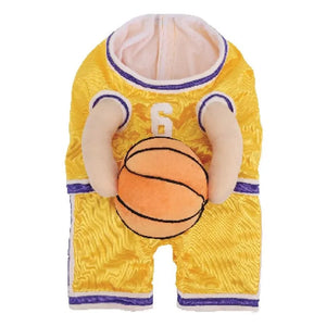 Yellow basketball jersey dog costume with number 6 holding a basketball on a white background
