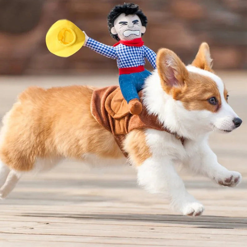 Cowboy Rodeo Rider Dog Costume with stubbled toy cowboy holding a yellow cowboy hat while riding on dog’s back