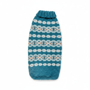 Teal knitted dog sweater with a pattern on a white background