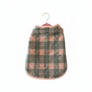 Pink and gray Plaid patterned dog puffer coat on a white background