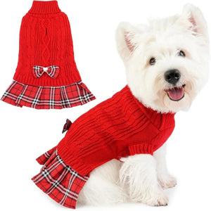 White dog wearing a red sweater with plaid skirt, next to a red sweater with plaid skirt on a white background.