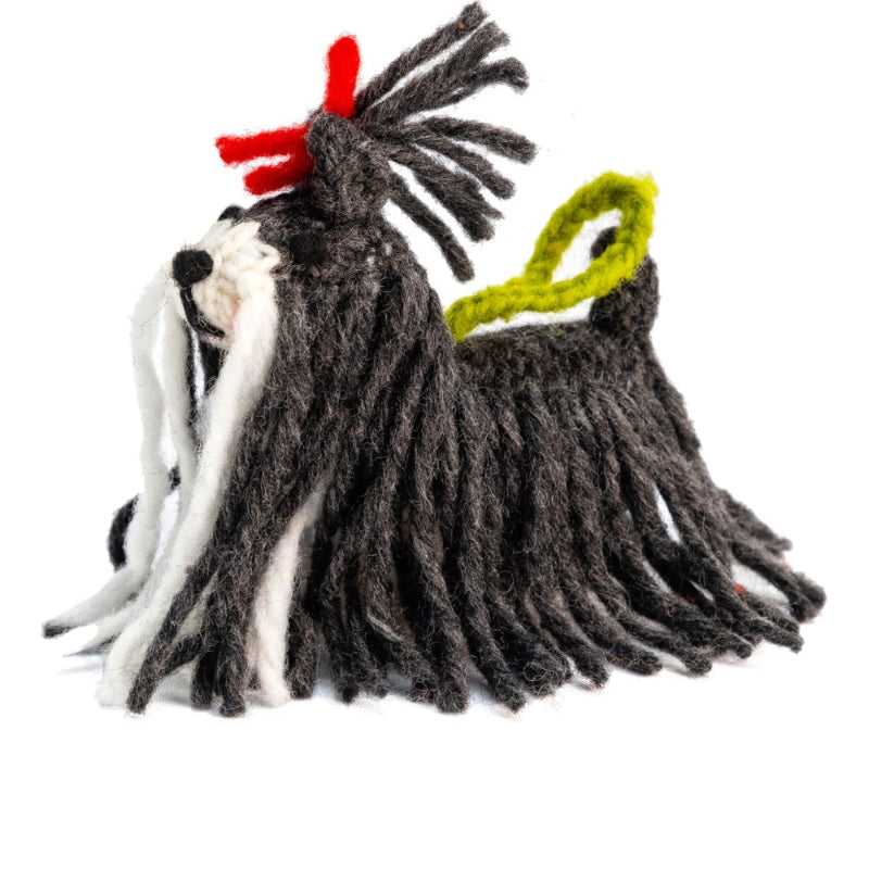 Shih Tzu ornament with red bow on a white background