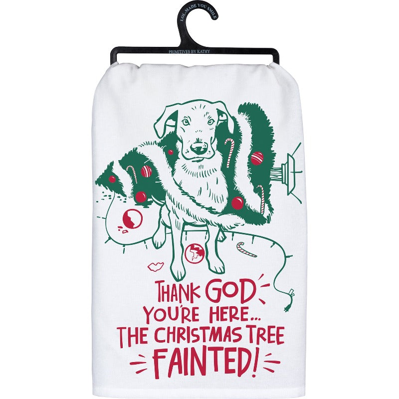 Kitchen Towel - Thank God You're Here. The Christmas Tree Fainted! White towel with dog outline, green Christmas tree and red lettering