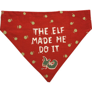 This reversible red Christmas dog collar bandana features  "The Elf Made Me Do It" sentiment with elf shoe and polka dot designs on one side.