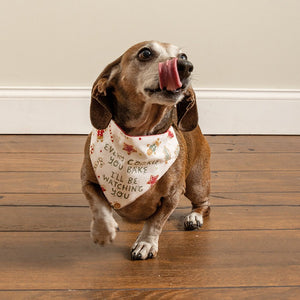 For small dogs, this reversible Christmas dog collar bandana features "Every Cookie You Bake I'll Be Watching You" sentiment and Christmas cookie designs on one side.