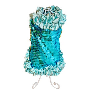 Designed exclusively for Posh Dog Life, this handmade “Ariel” couture dog party dress is exquisitely crafted by C’Mimi’s world-renowned pet fashion Designer Jan Ben with glittering aqua rectangular sequins, a light blue satin ruffle neck, midline and skirt, and a gorgeous multicolored rhinestone trim on the sleeves.