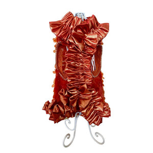 This handmade “Cayenne” burnt orange dog party dress is exquisitely crafted by C’Mimi’s world-renowned pet fashion Designer Jan Ben with the finest details, including shimmering ginger tear drop sequins and shimmering satin ruffles at the neckline, midline and skirt.