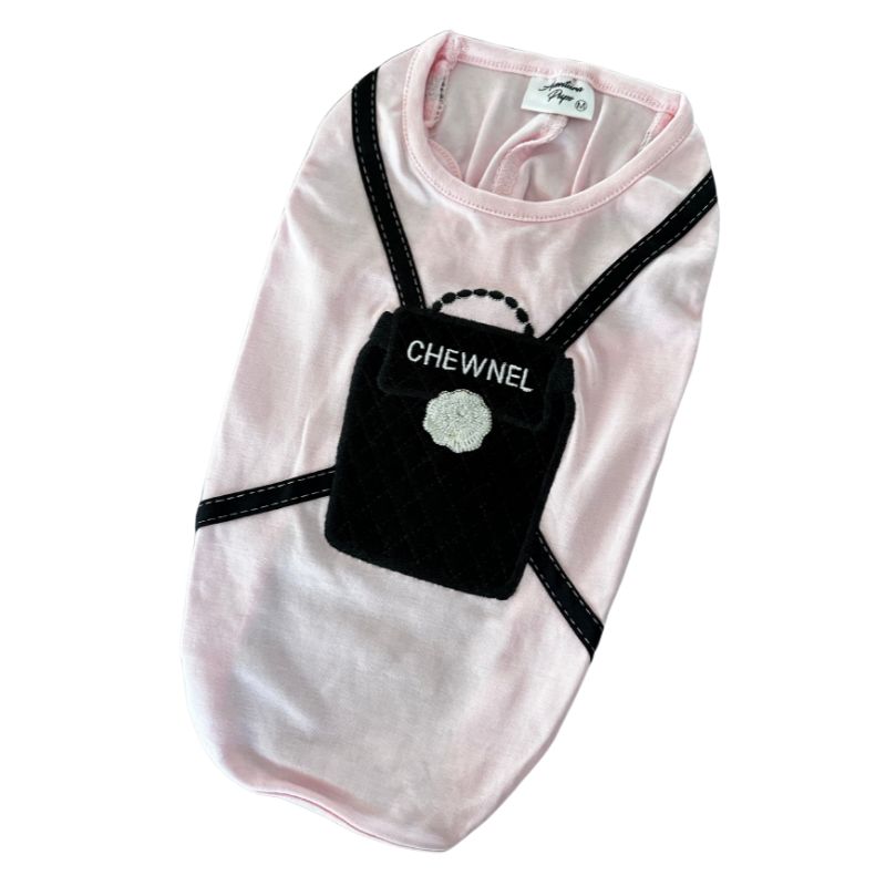 Made of 100% Pima cotton, this designer-inspired embroidered dog T-shirt by Aventura Pups features a Coco Chewnel Black Backpack on a light pink T-shirt.