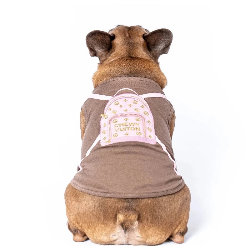 Made of 100% Pima cotton, this designer-inspired embroidered dog T-shirt by Aventura Pups features a parody Chewy Vuitton pink backpack on a mocha T-shirt.