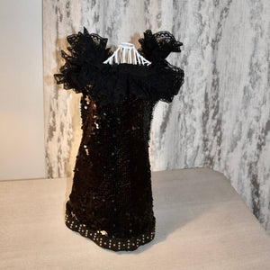 Truly a “Wow!”, this luxurious black sparkling dog dress fits all sizes and is a wonderful addition to your dog’s wardrobe for special occasions including holiday parties, weddings, anniversaries and photoshoots.