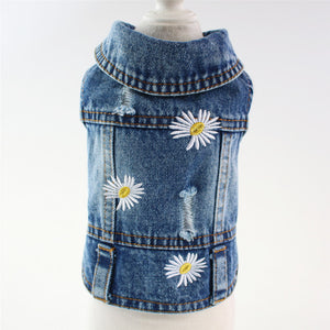 Channel your dog's inner flower child with this darling Daisy Denim Jacket from our Spring/Summer collection.