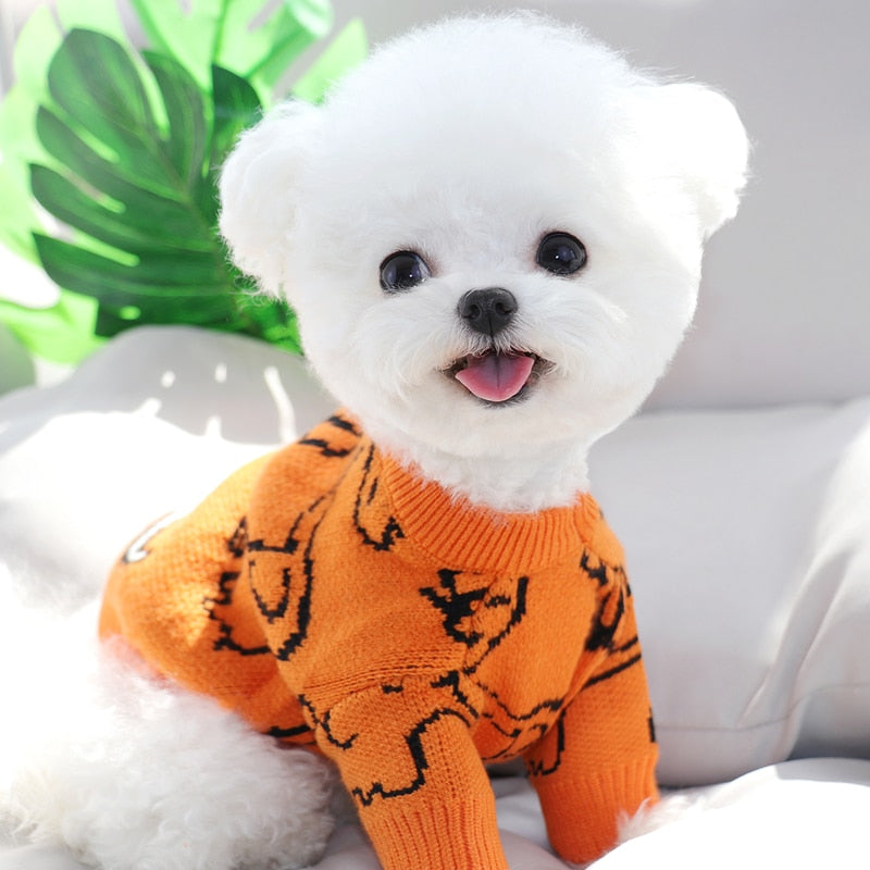 This Orange Elephant Dog Sweater is a fun addition to your buddy's wardrobe. 