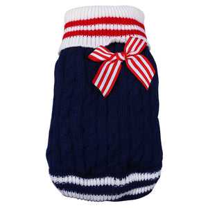 Red, White & Blue Cable Knit Dog Sweater is adorned with a striped bow.
