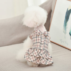 This Cream Plaid Dog Dress & Leash set fits small dogs.