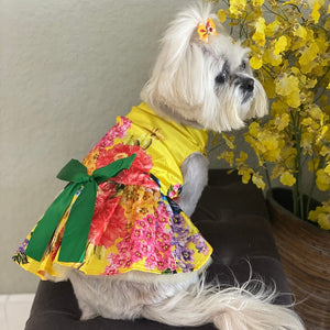 This stunning yellow floral dog party dress suits small dogs.
