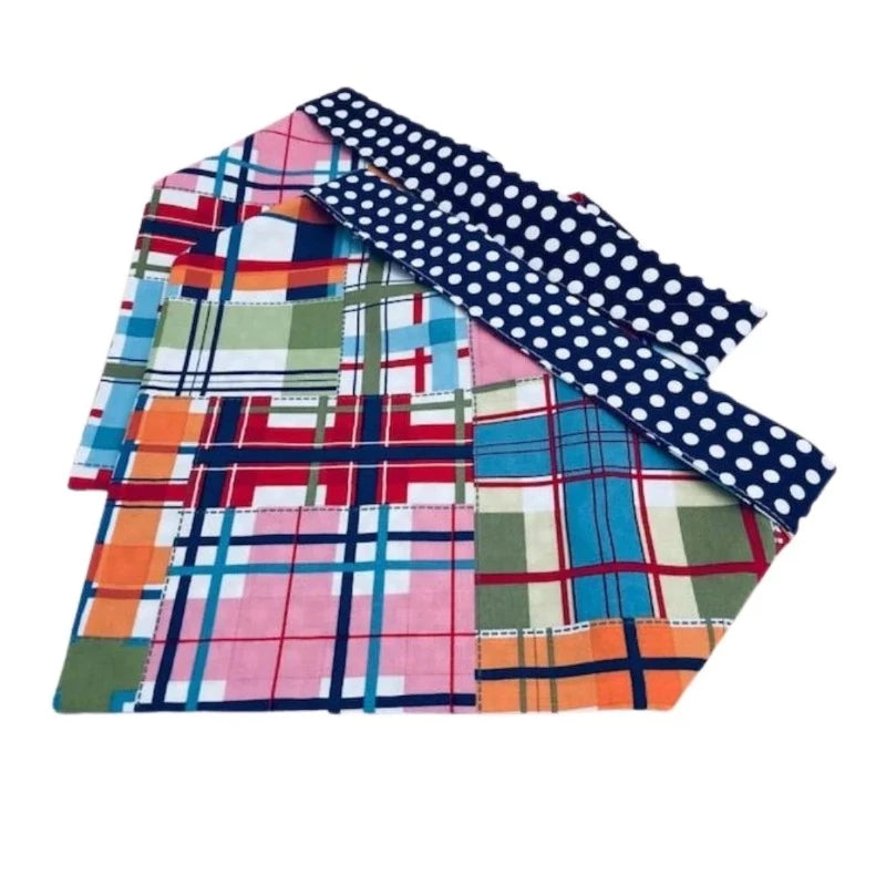 Handmade in the USA by Chloe & Max, this Madras Bandana features bright colorful plaid, with blue and white polka dot trim and backing. 
