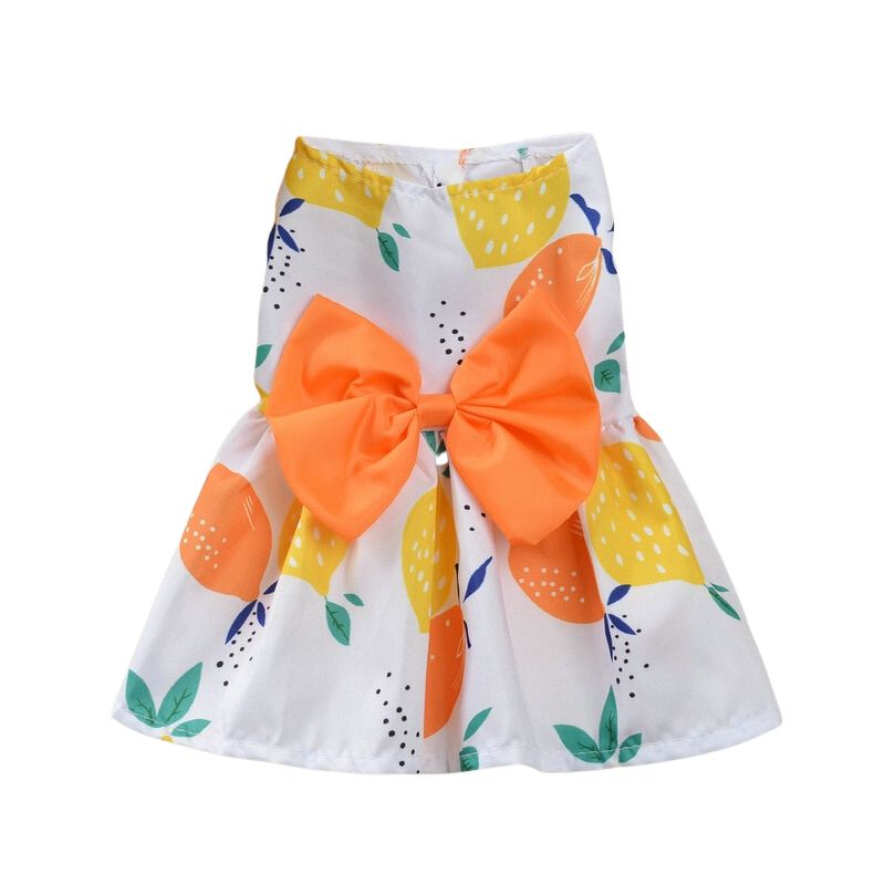 Adorned with an orange bow, this lightweight cotton Orange and Lemons Dog Dress from our Spring/Summer collection fits small dogs,