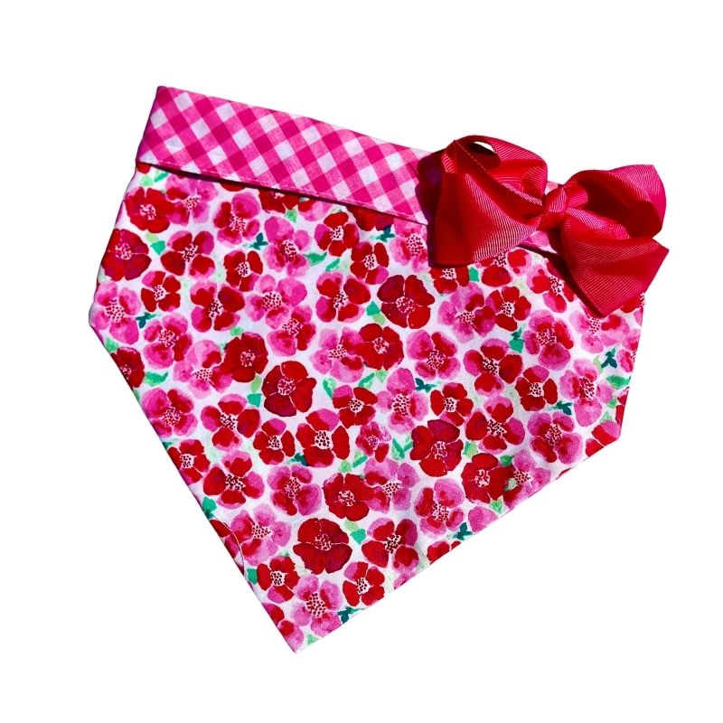 Handmade in the USA by Chloe & Max, this Pink Flowers Bandana Dog Collar features various shades of pink flowers on white, with pink gingham trim and backing.