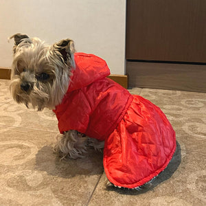 This Reversible Hooded Dog Coat is red one side and leopard on the other for the ultimate dog fashionista.