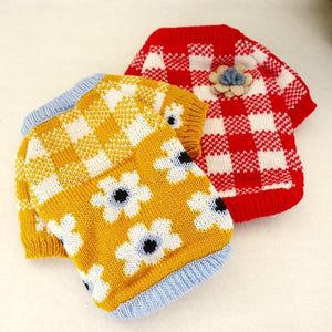 Handmade Floral Dog Sweaters are available in yellow or red.
