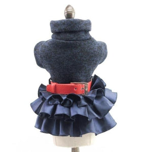 This Chic Turtleneck Sweater Dog Dress in blue has a red belt.