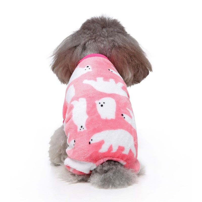 These pink Polar Bear Onesie dog pajamas will keep your pup warm and cozy.
