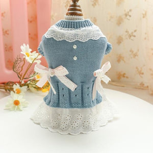 Blue Sweet Lace Dog Sweater Dress is adorned with bows, faux pearls and lace.