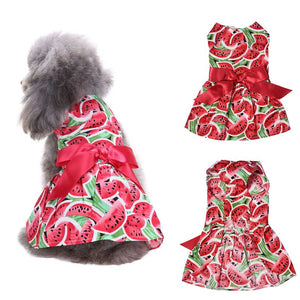 Adorned with a red satin bow, this tasty dog dress fits small breed dogs like Toy Poodles.