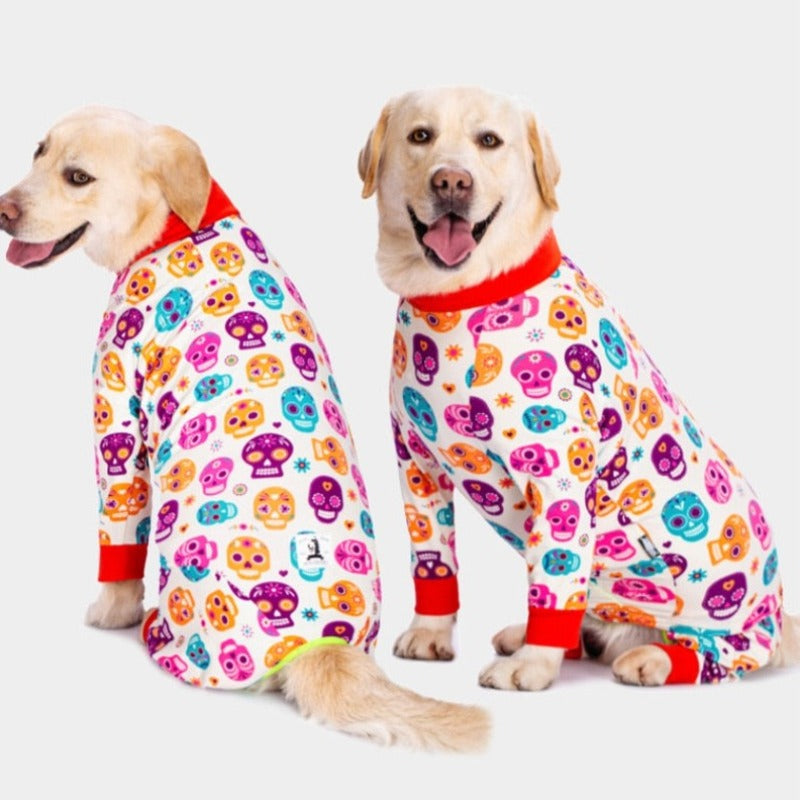These Day of the Dead Onesie Large Dog PJs, featuring brightly colored skulls, are designed for large dogs.