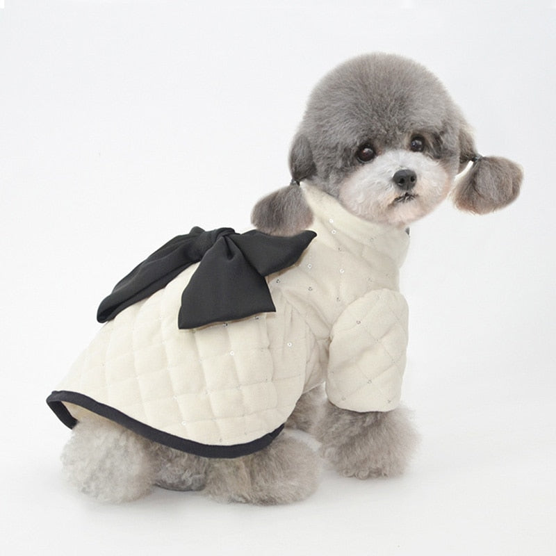 Who's a pretty girl? Your pooch will look stunning in this Luxurious Black & White Dog Dress Coat, perfect for everyday walks or dressier celebrations.
