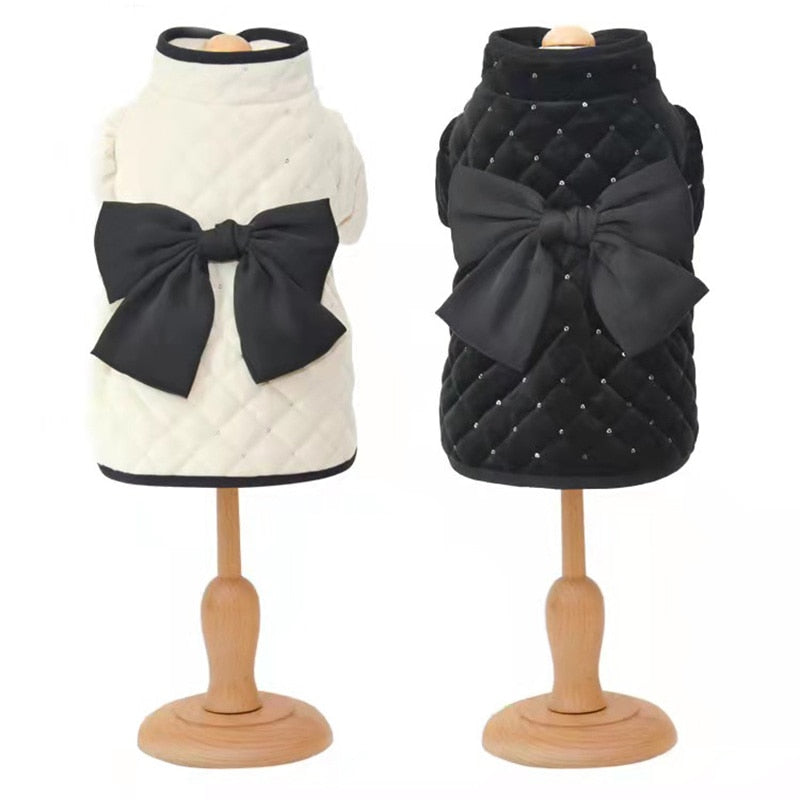 Who's a pretty girl? Your pooch will look stunning in this Luxurious Black & White Dog Dress Coat, perfect for everyday walks or dressier celebrations.